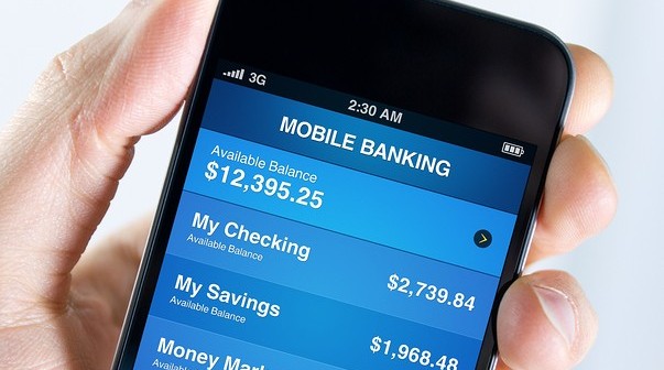 bigstock-Mobile-Banking-On-Apple-Iphone-34189727-e1364929699726