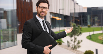 Real,Estate,Agent,With,Leather,Portfolio,Outdoors.,Space,For,Text