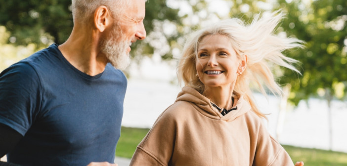 Mature,Middle,Aged,Senior,Couple,Running,Together,In,The,Park