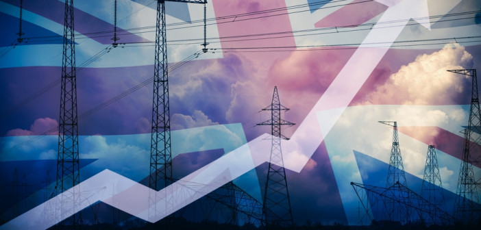Rising,Up,Arrow,Against,Uk,Flag,And,Power,Line,Silhouette