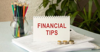 Business,Concept,-,Top,View,Notebook,Writing,Financial,Tips