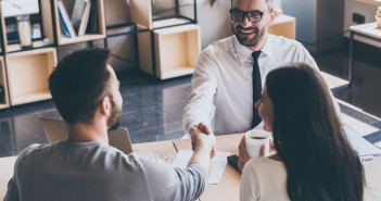 Sealing,A,Deal.,Top,View,Of,Two,Men,Sitting,At