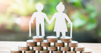5 tips to help manage retirement savings Couple,Older,Model,Standing,On,Money,Coins,Saving,For,Concept