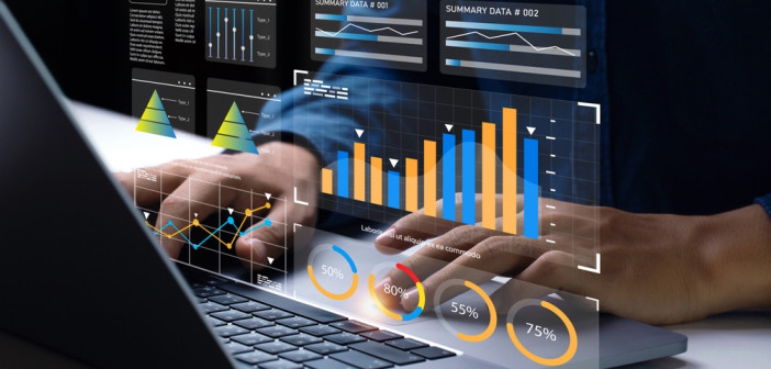 Analyst,Works,On,Personal,Computer,Showing,Business,Analytics,Dashboard,With