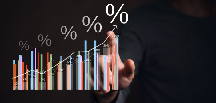 Interest,Rates,And,Dividends,,Business,People,Calculate,And,Higher,Graphs