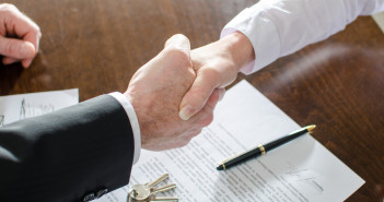 Estate,Agent,Shaking,Hands,With,His,Customer,After,Contract,Signature