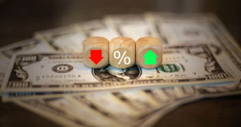 The,Dice,Show,A,Red-green,Arrow.,And,Percentages,On,Dollar