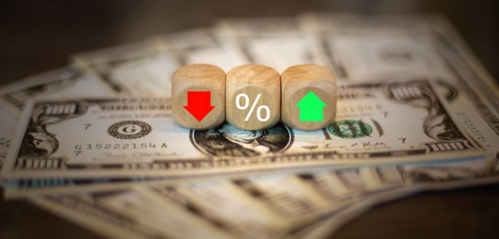 The,Dice,Show,A,Red-green,Arrow.,And,Percentages,On,Dollar