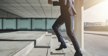 Businessman,Running,Fast,Upstairs.,Horizontal,Outdoors,Shot.