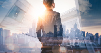 The,Double,Exposure,Image,Of,The,Business,Man,Standing,Back