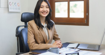 Secretary,Concept,,Female,Secretary,Sitting,On,Her,Desk,And,Working