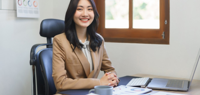 Secretary,Concept,,Female,Secretary,Sitting,On,Her,Desk,And,Working