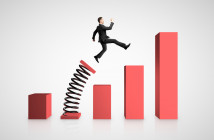 Businessman,Launching,On,Spring,Chart.,Financial,Growth,And,Success,Concept.