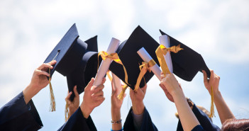 Graduation,Caps,Thrown,In,The,Air