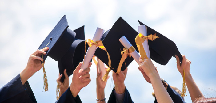 Graduation,Caps,Thrown,In,The,Air