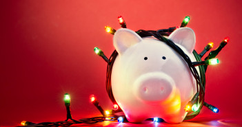 Piggy,Bank,Wrapped,In,Christmas,String,Lights