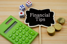 Financial,Concept,:,Note,With,Written,Word,Financial,Tips,(coins,dices