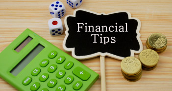 Financial,Concept,:,Note,With,Written,Word,Financial,Tips,(coins,dices