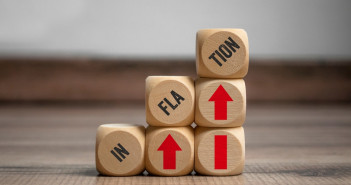 Cubes,,Dice,Or,Blocks,With,Inflation,On,Wooden,Background