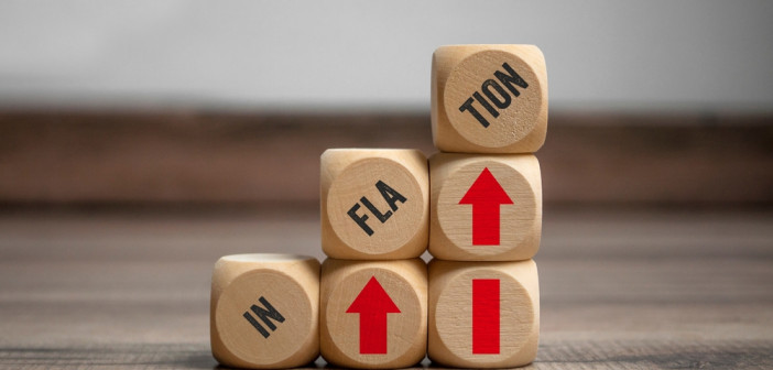 Cubes,,Dice,Or,Blocks,With,Inflation,On,Wooden,Background