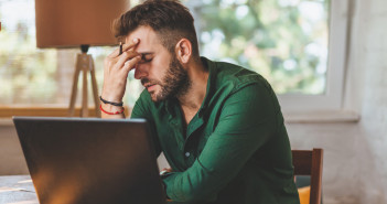 Young,Man,Having,Stressful,Time,Working,On,Laptop