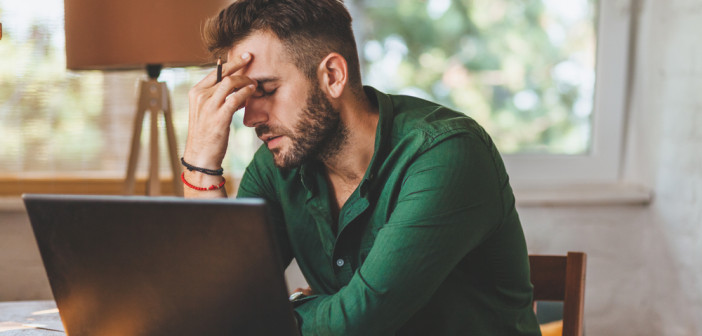 Young,Man,Having,Stressful,Time,Working,On,Laptop