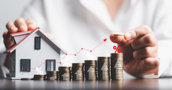 Business,Woman,Hand,And,Stack,Coins,Money,With,Up,Arrow