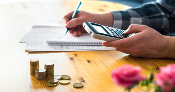Four Things Gen Xers Can Do Now to Reach Retirement Goals Man,Using,Calculator,And,Counting,Budget,,Expenses,And,Savings.,Low
