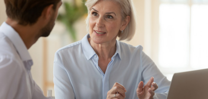 Middle,Aged,Old,Businesswoman,Manager,Mentor,Speaking,To,Businessman,Client