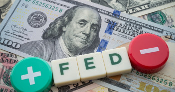 US Federal Reserve holds interest rates steady as inflation ticks up Plus,And,Minus,Symbol,On,Us,Dollar,Banknotes,Background.,The