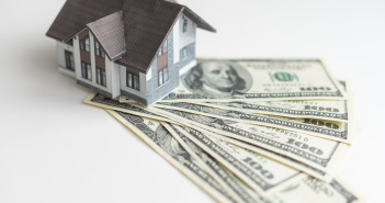 Little,House,Model,With,Many,Dollar,Banknotes,And,Keys.,Real