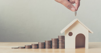 Property,Investment,And,House,Mortgage,Financial,Concept,,Hand,Putting,Money