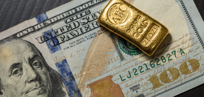 Gold,Bullion,On,100,Us,Dollar,Note