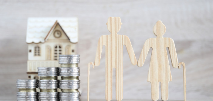Mutual,Fund,love,Couple,Senior,And,Model,House,On,Wooden,Background,
