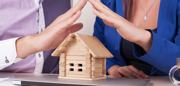 Protect,Your,Home,-,Small,House,Shielded,With,Hands