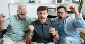 Enthusiastic,Three,Generation,Of,Family,Men,Fans,Watch,Football,Championship