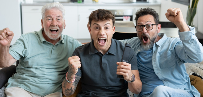 Enthusiastic,Three,Generation,Of,Family,Men,Fans,Watch,Football,Championship