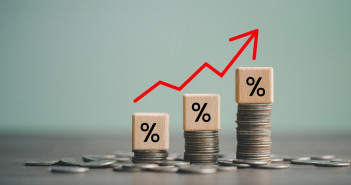 Inflation,Concept,,Red,Graph,Arrow,,Percent,Sign,On,A,Wooden