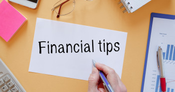 Office,Desk,With,Electronic,Devices,And,Documents.,Financial,Tips,Inscription