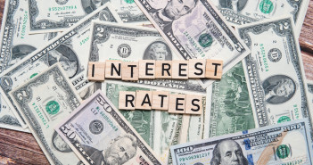 The,Inscription,Interest,Rates,On,The,Background,Of,American,Dollars.