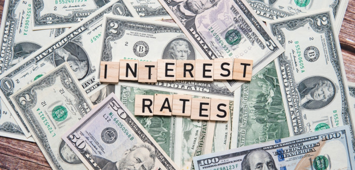 The,Inscription,Interest,Rates,On,The,Background,Of,American,Dollars.