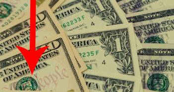 Us,Dollar,Bills,And,Red,Arrow,Pointing,Downwards,Indicating,Us
