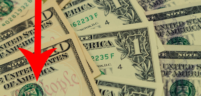 Us,Dollar,Bills,And,Red,Arrow,Pointing,Downwards,Indicating,Us