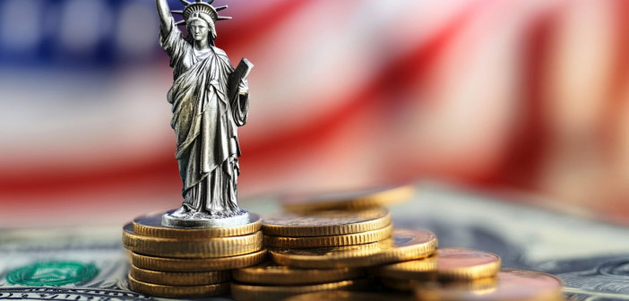 Federal Reserve keeps interest rate unchanged, sees slower growth and higher inflation